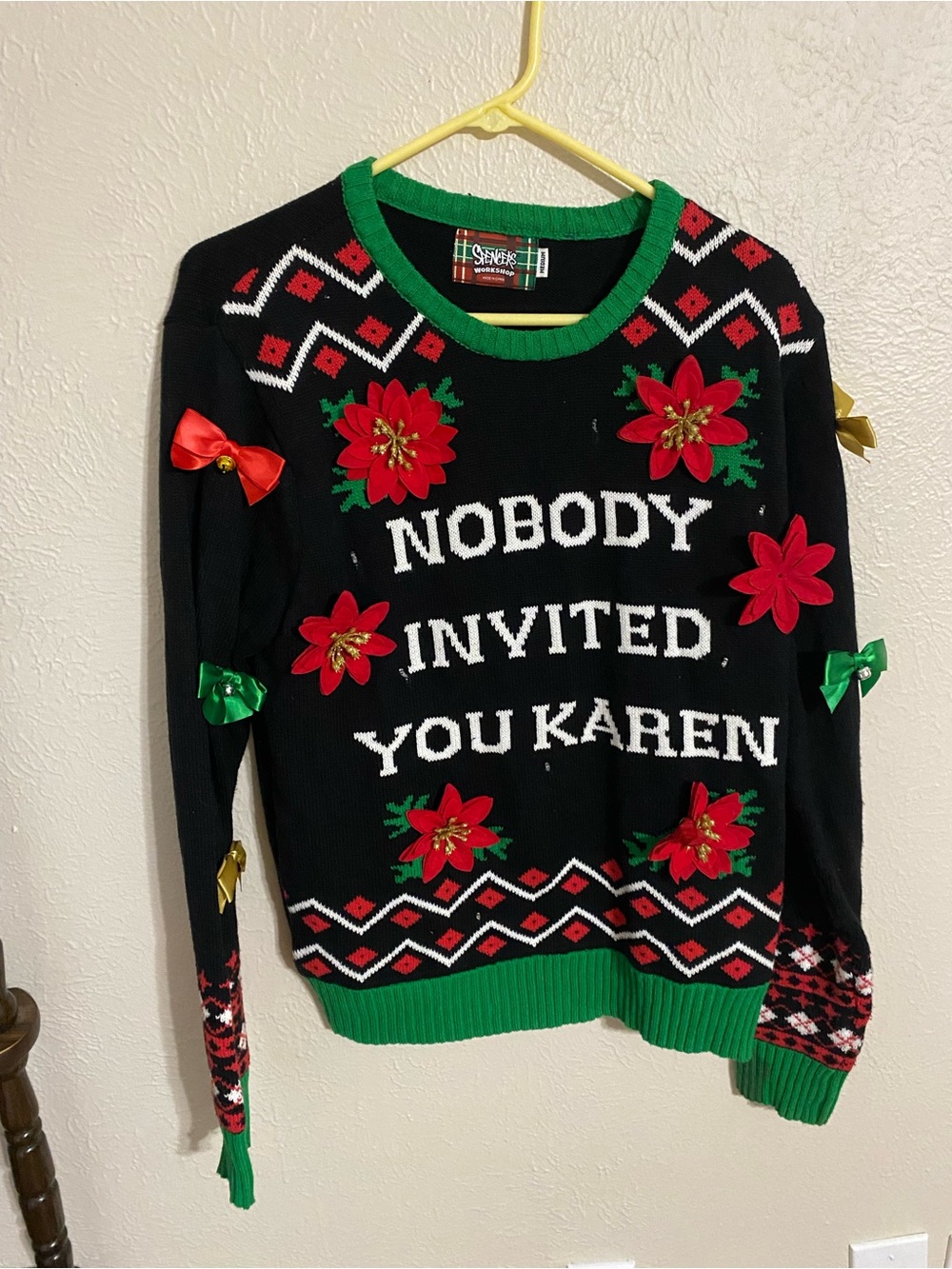 Spencer's Black Holiday Sweater with Red Poinsettias and Green Trim